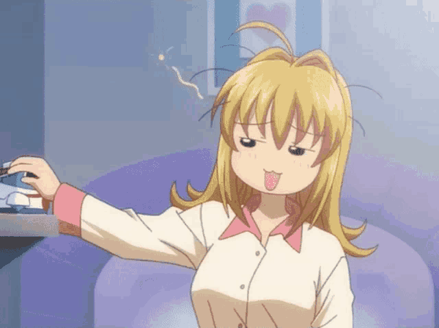 a blonde anime girl making a funny face with her tongue sticking out
