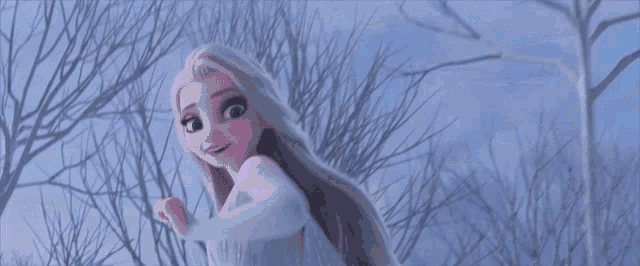 elsa from the movie frozen 2 is standing in the snow with her arms outstretched
