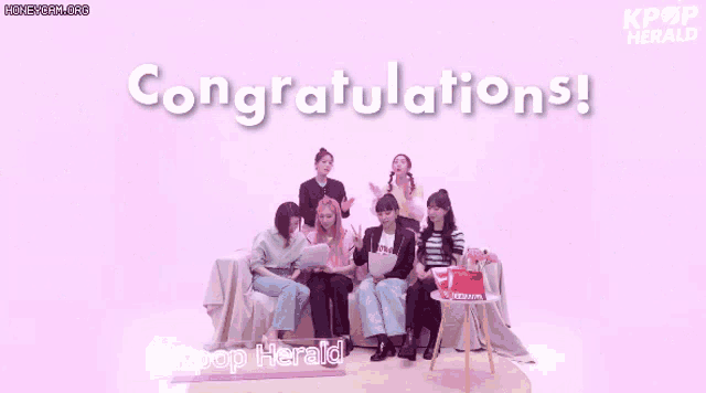a group of women sitting on a couch with the words congratulations written on the top