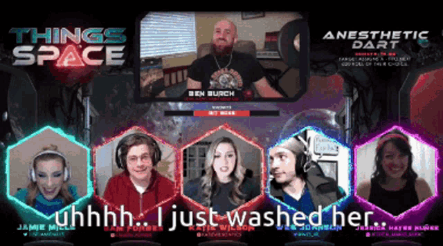 a group of people are sitting in front of a screen that says things space on it