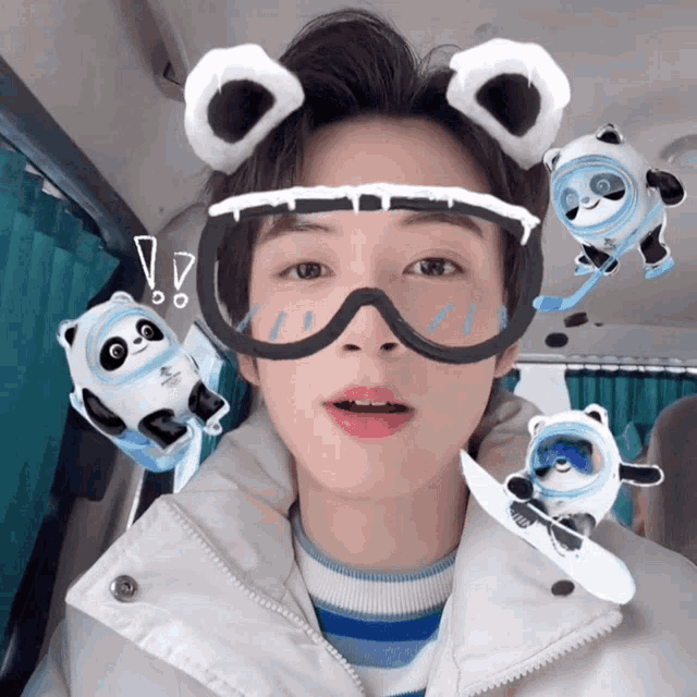 a person wearing a pair of goggles with a panda bear on them