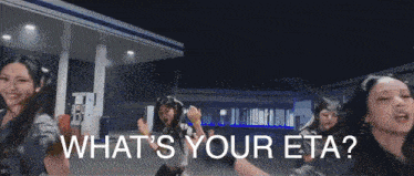 a group of women are dancing in front of a gas station with the words " what 's your eta " on the bottom