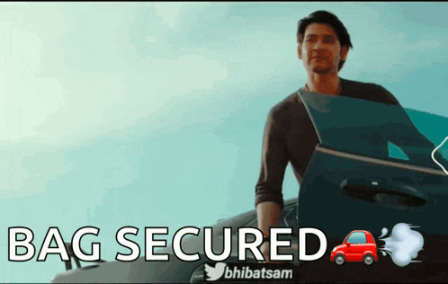 a man is standing next to a car with the words bag secured