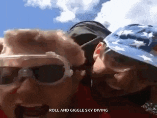 a couple of people are standing next to each other with the words roll and giggle sky diving below them