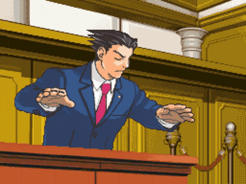 a man in a suit and tie stands at a podium with his hands outstretched