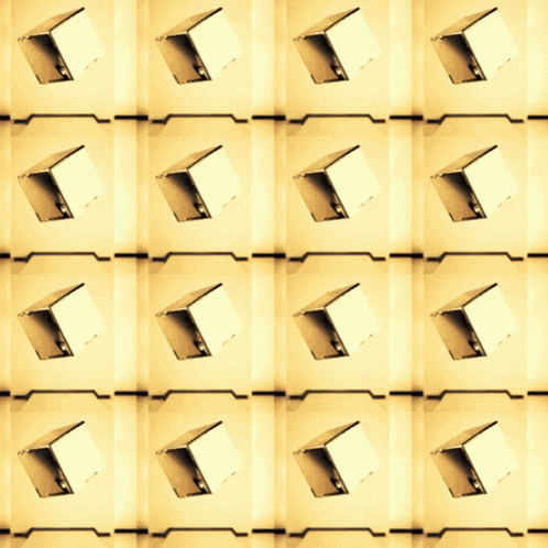 a row of black cubes are lined up in a row