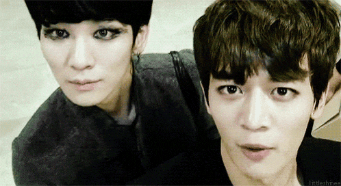two young men are posing for a picture with the caption littleshinee on the bottom right