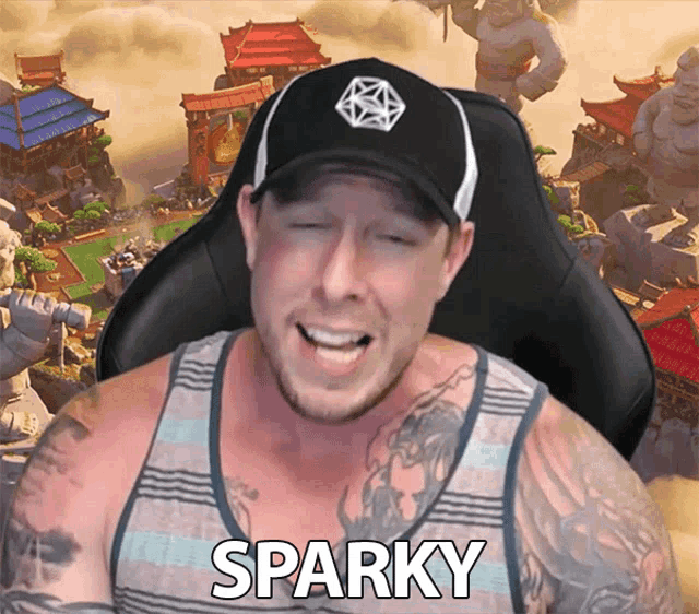 a man wearing a hat and a tank top with the word sparky on it