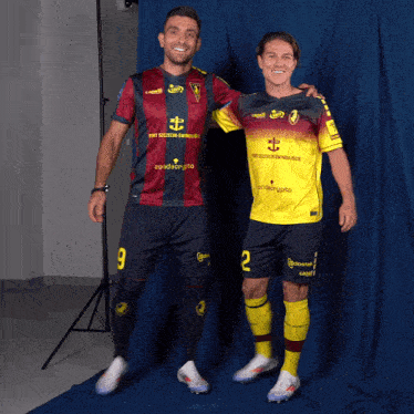 two soccer players are posing for a picture with one wearing a jersey that says ' condecrypto ' on it
