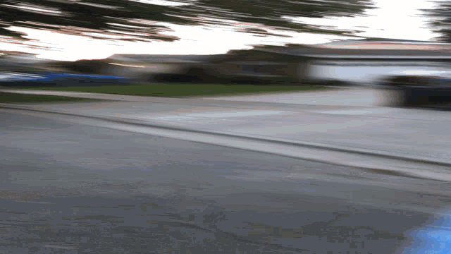 a blurry picture of a person walking down the street