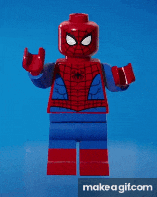 a lego figure of spider-man is standing on a blue surface