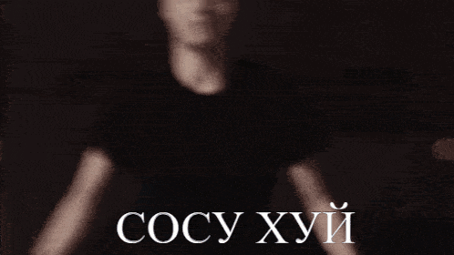 a black and white photo of a man with the words cocy хуй written on the bottom