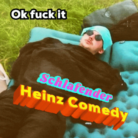 a man laying on an air mattress with the words ok fuck it schlafender heinz comedy