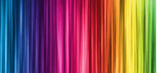 a close up of a rainbow colored curtain .