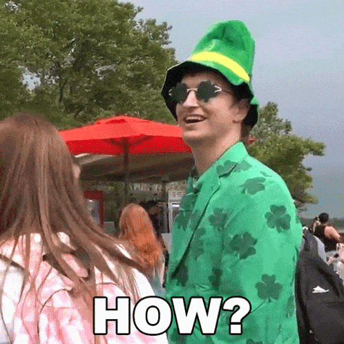 a man in a leprechaun costume is asking a girl how