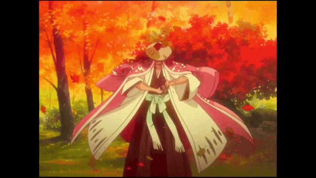 a man in a pink and white kimono is standing in front of a forest