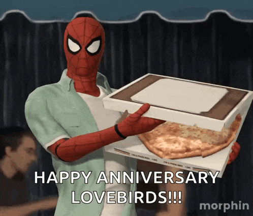 a spider man holding a box of pizza with the words happy anniversary lovebirds written below him