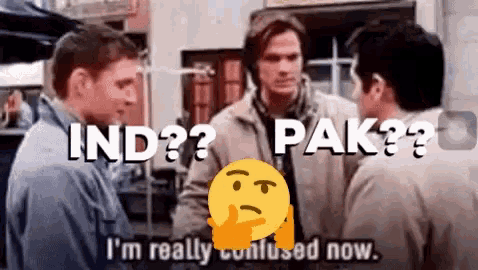 a group of men are standing next to each other and one of them is thinking about something .