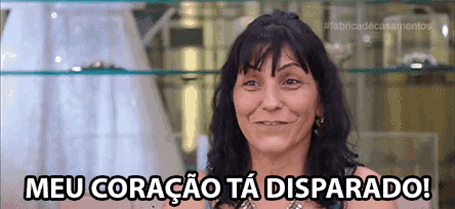 a woman says meu coracao ta disparado in a video
