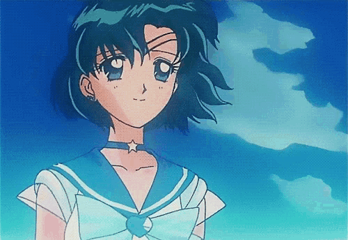a girl with blue hair and a star necklace