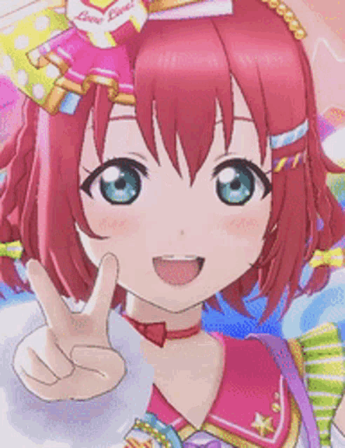 a close up of a girl with red hair giving a peace sign