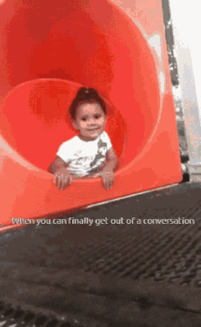 a little girl is sitting on a slide with the words " when you can finally get out of a conversation "