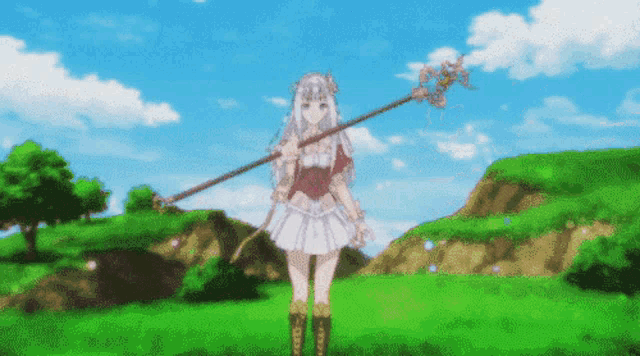 a girl in a white dress is holding a long stick in a field