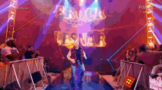 a wrestler named lesnar is walking through a ring