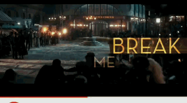 a crowd of people gathered in front of a building that says break me