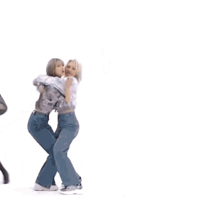 two girls hugging each other with the year 2021 on the bottom