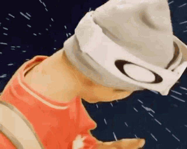 a close up of a person wearing a beanie and goggles in space .