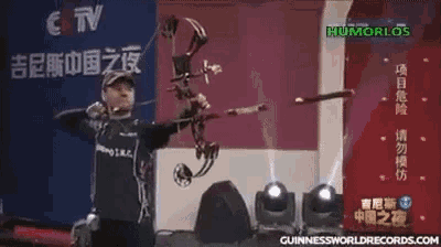 a man is holding a bow and arrow in front of a humorlos logo