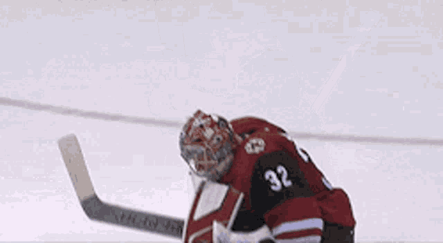 a hockey player with the number 32 on his back