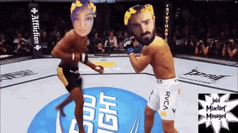 a man in a rvca shorts is fighting another man in a boxing match