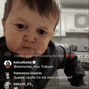 a baby 's face is shown in a kitchen with the words thanks guys for showing me love at the top