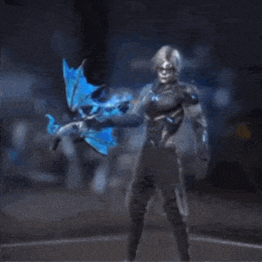 a skeleton with wings is surrounded by blue flame