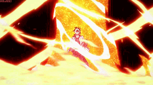 a person in a red shirt is surrounded by a huge fireball .