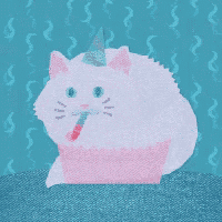 a pink cat wearing a party hat is drinking from a cup