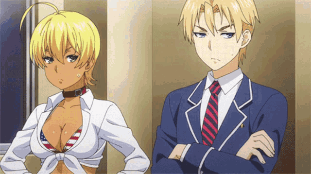 a man in a suit and tie stands next to a woman in a bikini