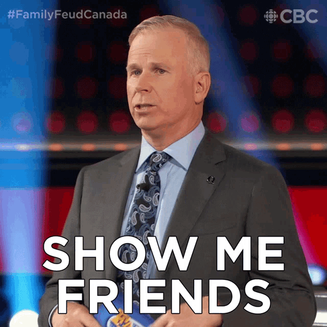 a man in a suit and tie is saying " show me friends "