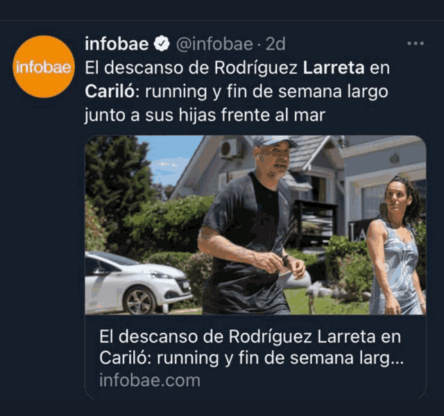 a man and woman are running in front of a house