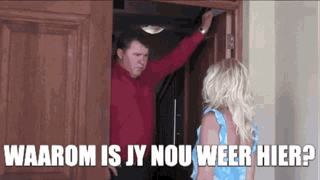 a man and a woman are standing in a doorway with the words waarom is jy nou weer hier on the bottom