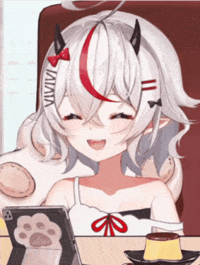 a girl with horns and the word viviata on her head is smiling