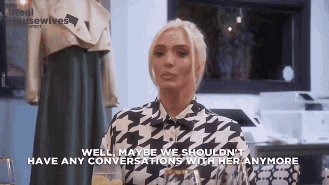 a woman in a houndstooth shirt says well maybe we should n't have any conversations with her anymore