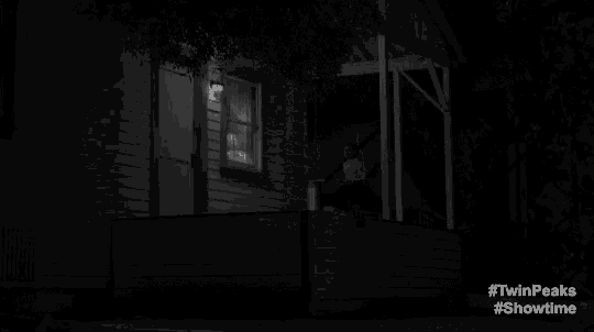 a black and white photo of a house at night with the words twin peaks showtime on the bottom