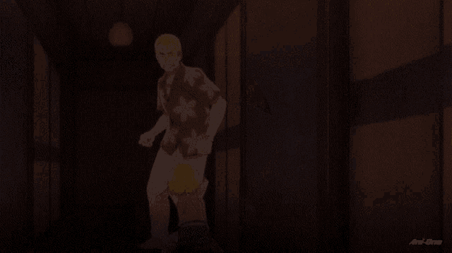 a girl is being punched in the face by a man in a dark room