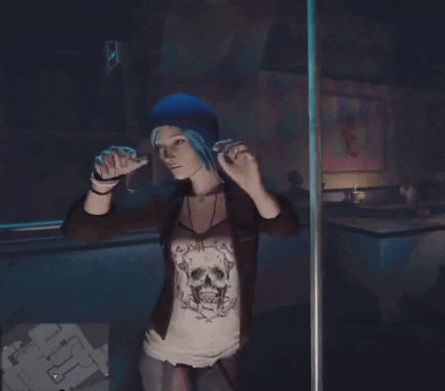 a woman with blue hair is standing on a pole wearing a skull shirt