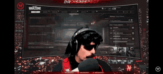 a man wearing headphones and a red vest is playing a video game called warzone
