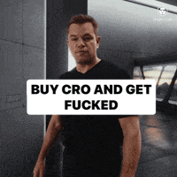 a man in a black shirt is standing in front of a sign that says buy cro and get fucked