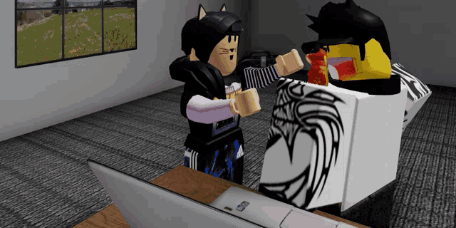 a girl in a cat ear hoodie stands next to a laptop
